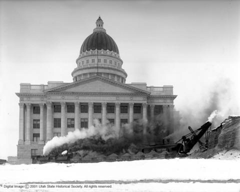 an image of the Utah state capitol with smoke in front of it.