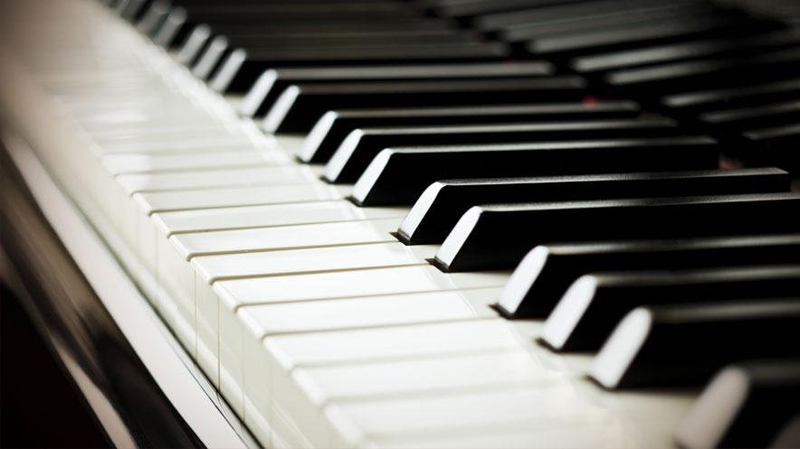 view looking down the length of piano keys